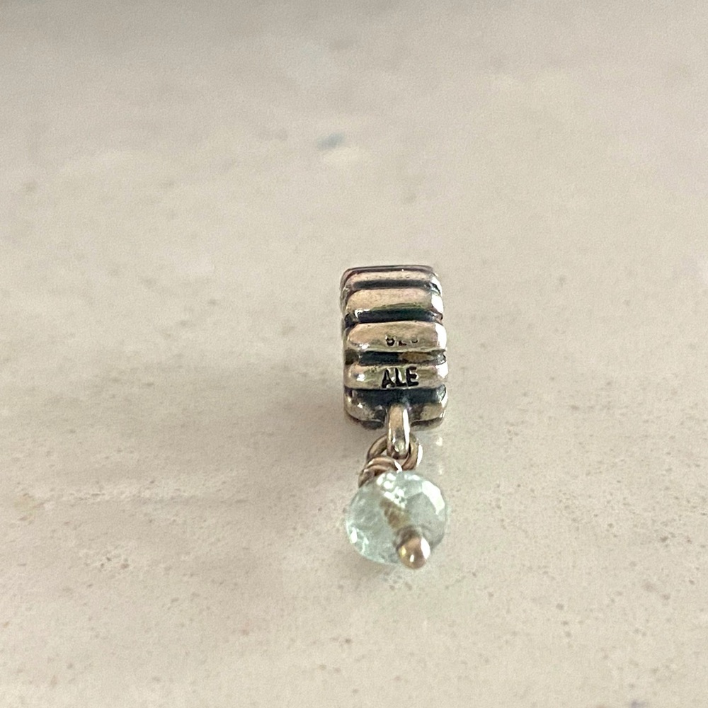 RETIRED PANDORA Silver Charm with Blue stone.